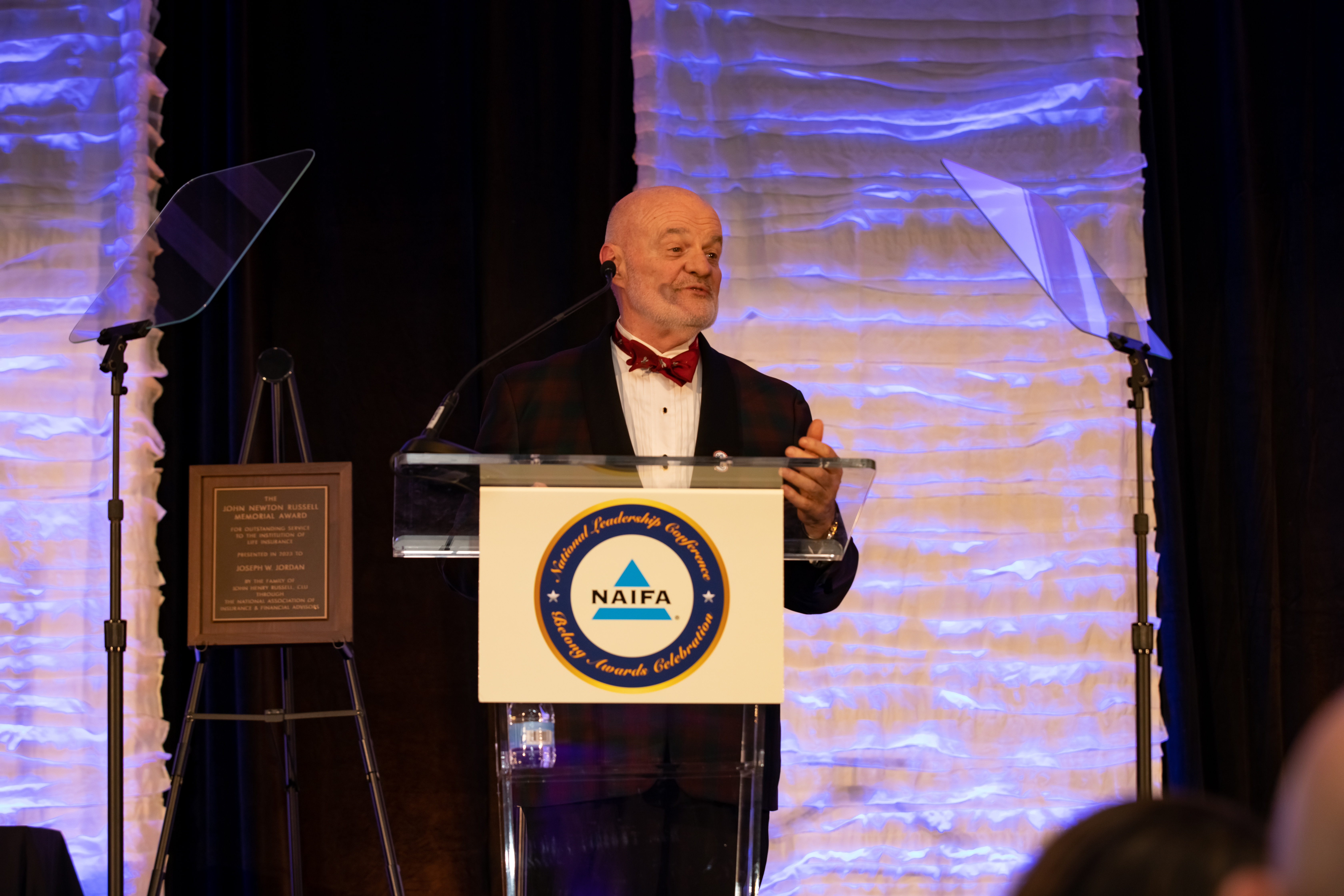 Joe Jordan receives the 2023 JNR Award during NAIFA's Belong Event